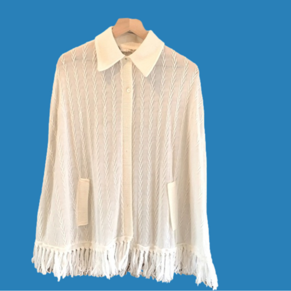 Cream colored one size vintage cape.